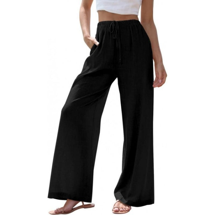 Wide palazzo pants for women with elastic waistband and side pockets Lune London