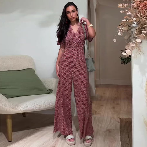 Women's jumpsuit with elastic waistband and deep V-neck Lune London