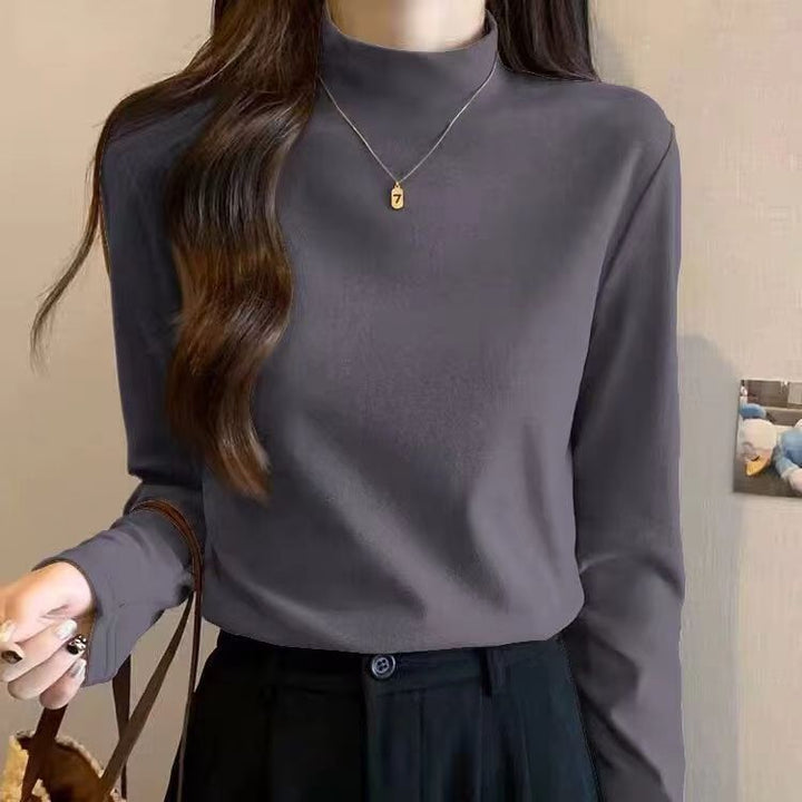 Chemise à manches longues pour femmes avec col montant et fine structure Chic & Stil