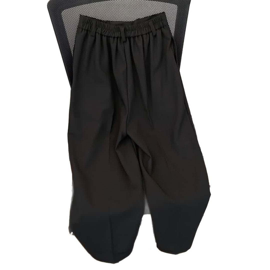 Pantalon élégant pour femmes taille haute avec plis et jambes larges Chic & Stil