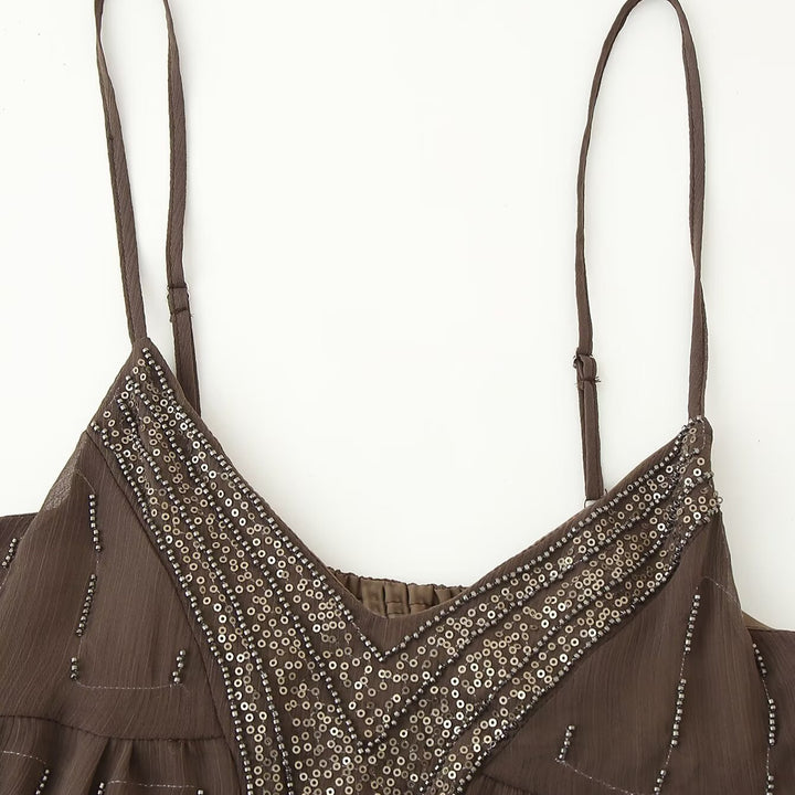 Summer dress for women with an elegant V-neckline and refined ruffle details Lune London