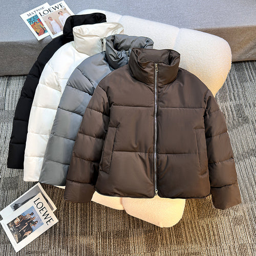 Short quilted jacket for women with high collar and practical piped pockets Lune London