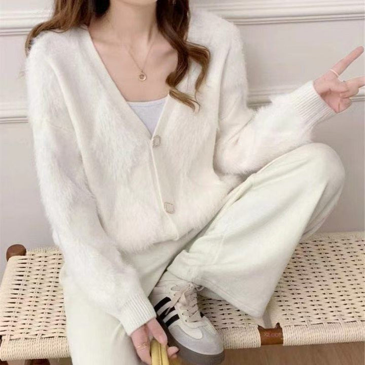 Cardigan femme en peluche avec détails boutonnés Chic & Stil