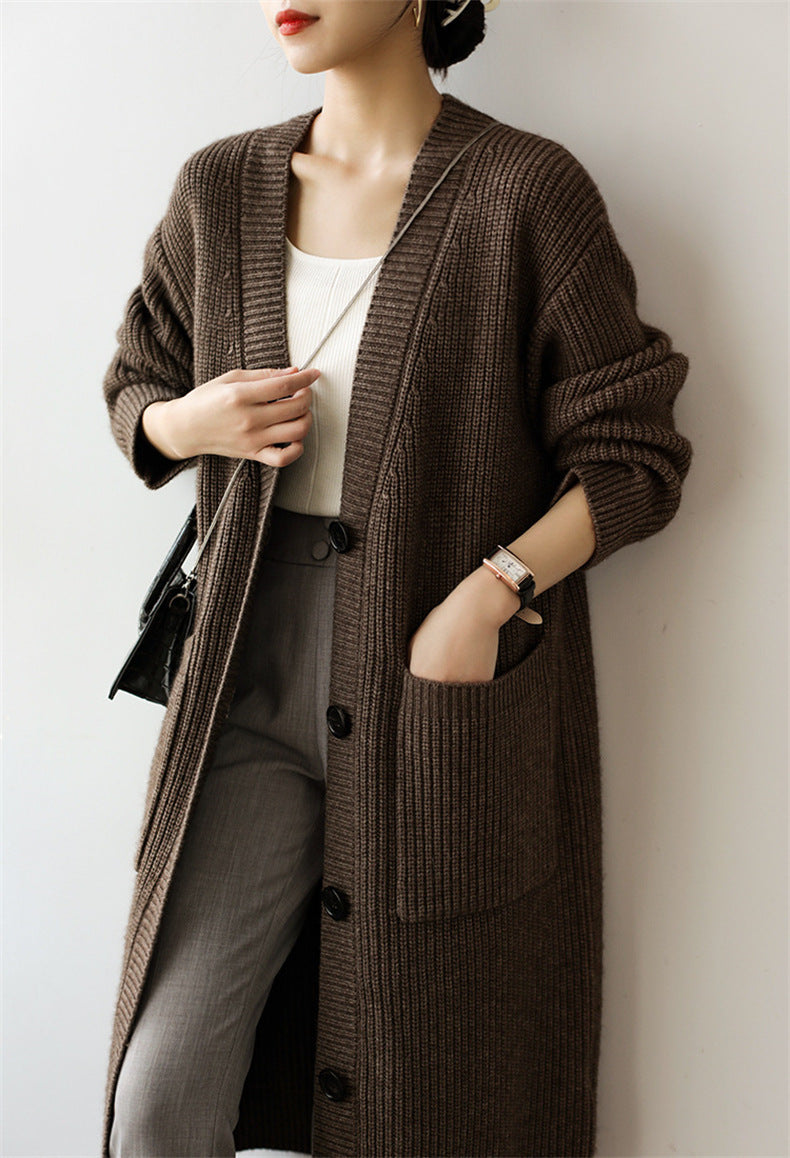 Knit coat for women with practical side pockets and elegant button details Lune London