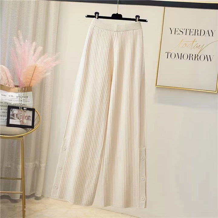 Pleated palazzo pants for women with button details Lune London