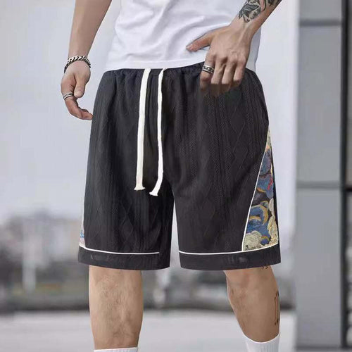 Men's athletic leisure pants with a creative floral design Lune London