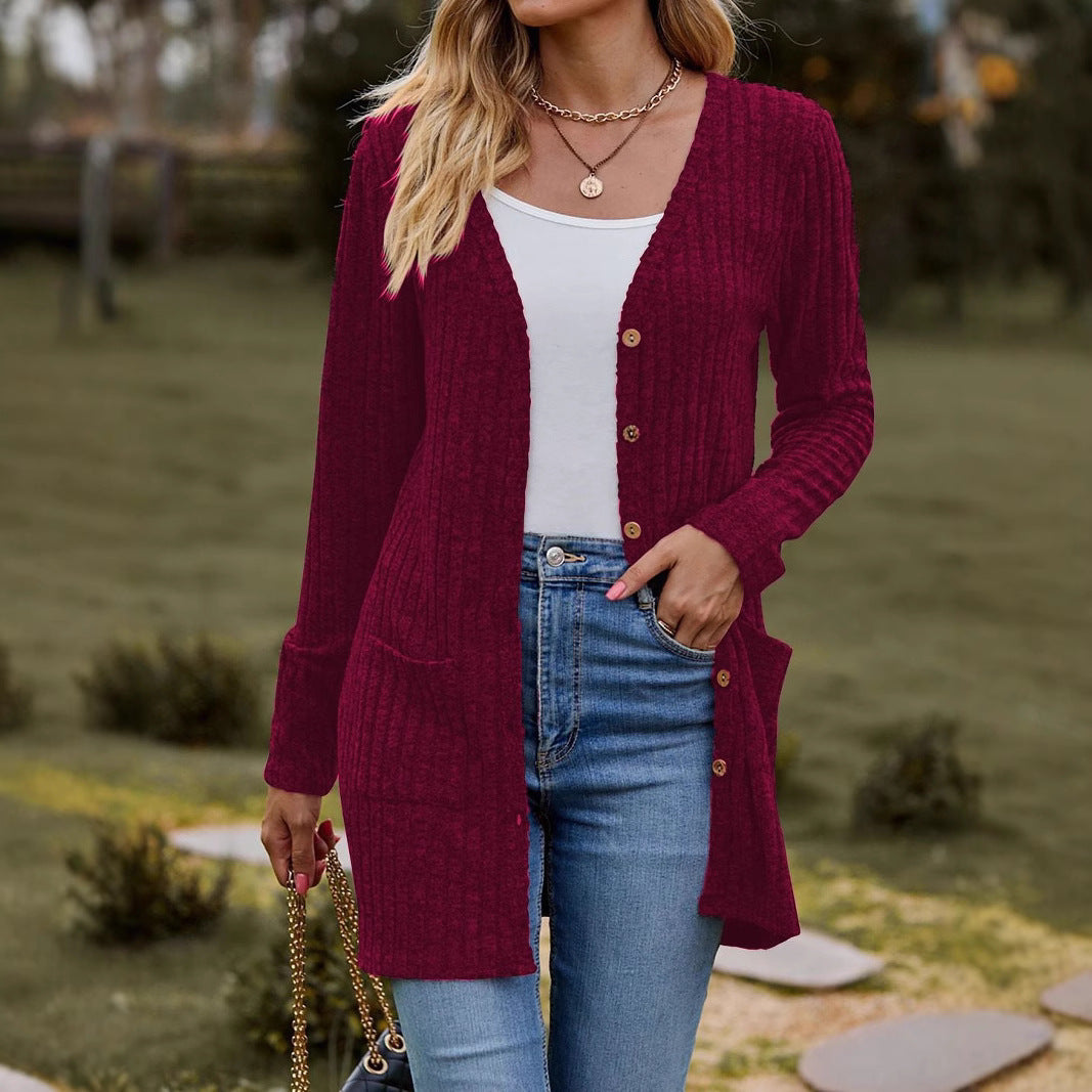 Women's knitted jacket with V-neck and practical pockets Lune London