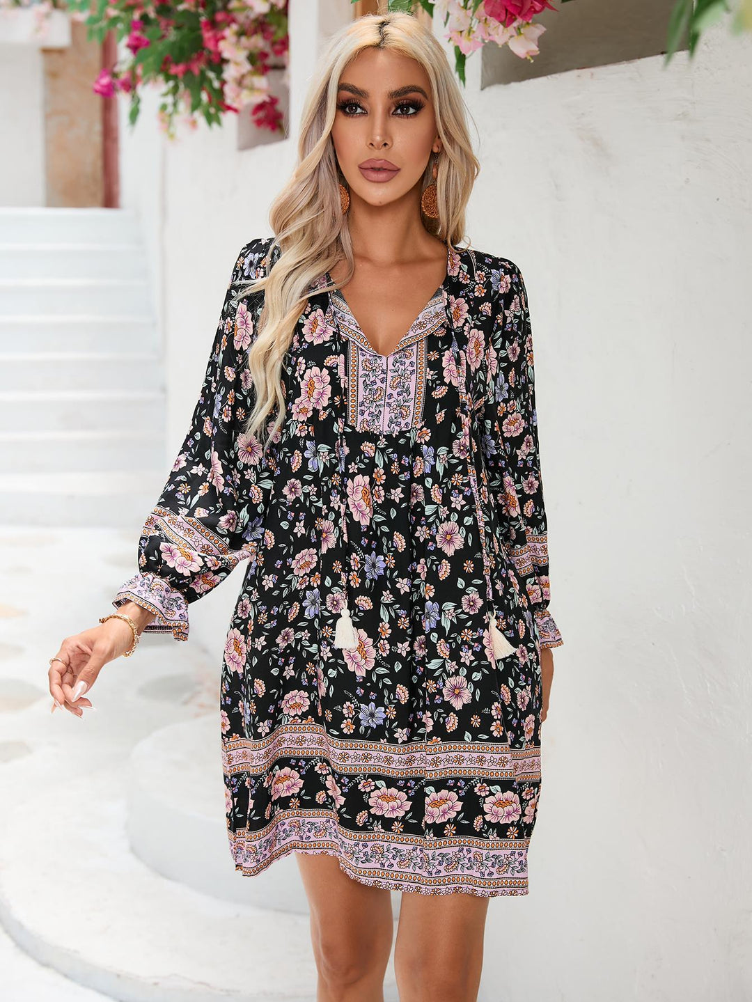 Ladies playful floral dress with flounced sleeves and V-neck Lune London