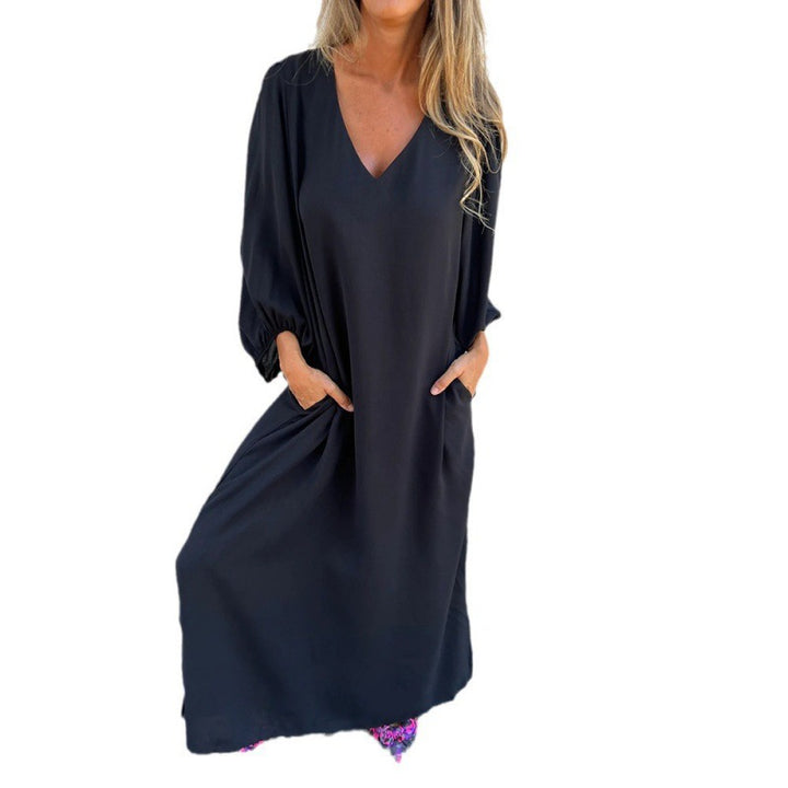Maxi dress for women with deep V-neckline and practical side pockets Lune London