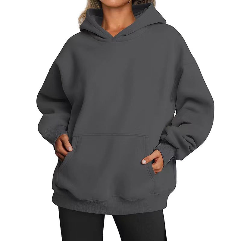 Women's oversized hoodie with practical kangaroo pockets and soft inner lining Chic & Stil
