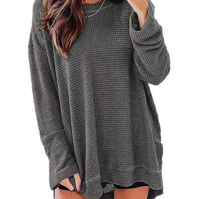 Waffle knit long sleeve sweater for women with open cut and side slits Lune London
