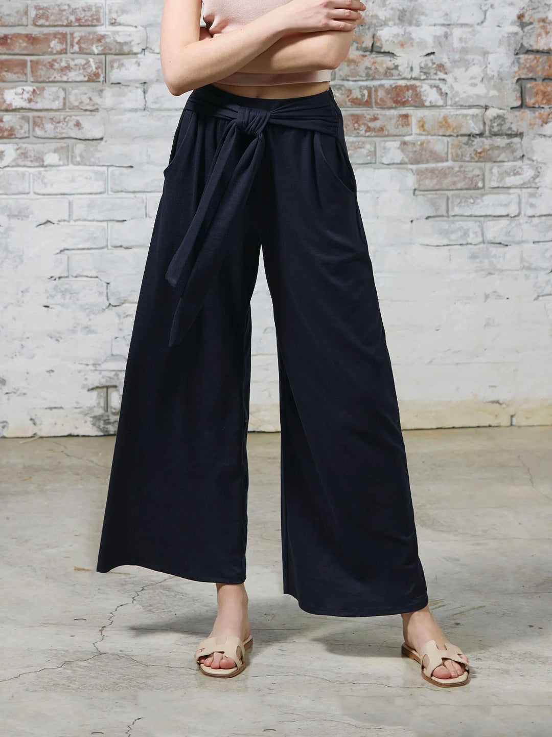 Loose jersey pants for women with a tie belt and high waist Lune London