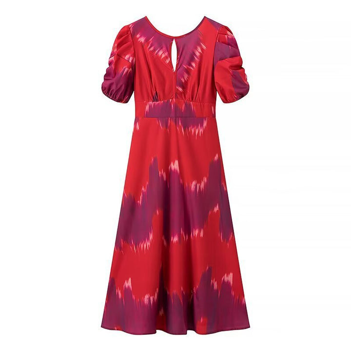 Maxi dress for ladies with elegant gather and modern puff sleeves Lune London