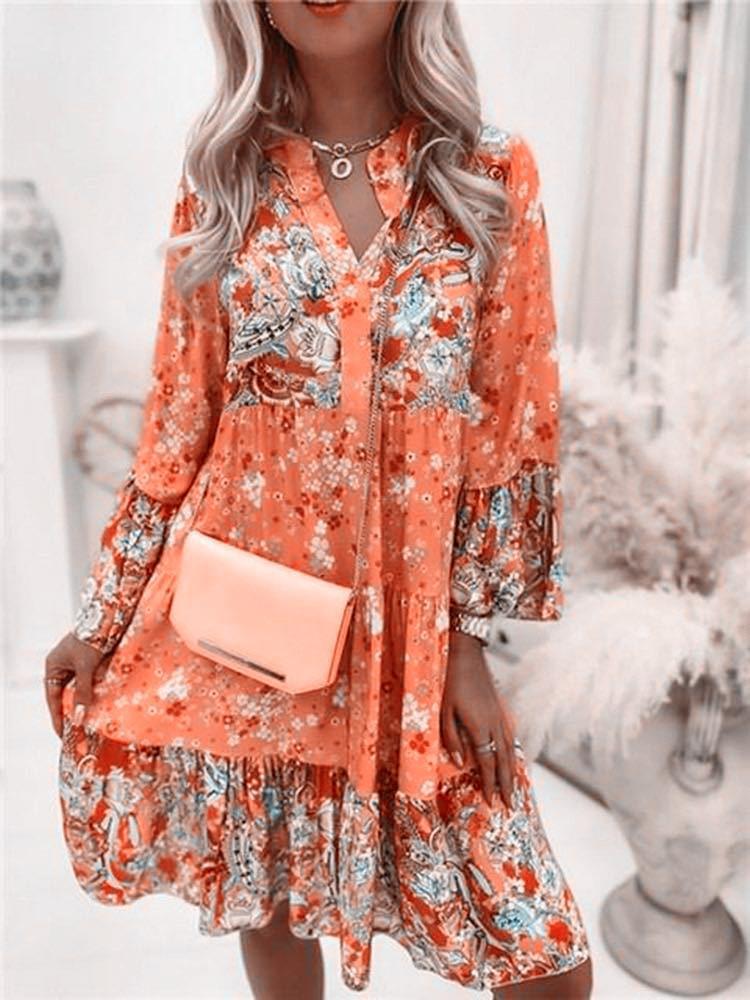 Elegant blouson dress for ladies with floral design and ruffles Lune London