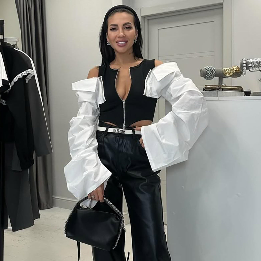 Ladies High fashion with striking puffed sleeves and a chic zipper closure