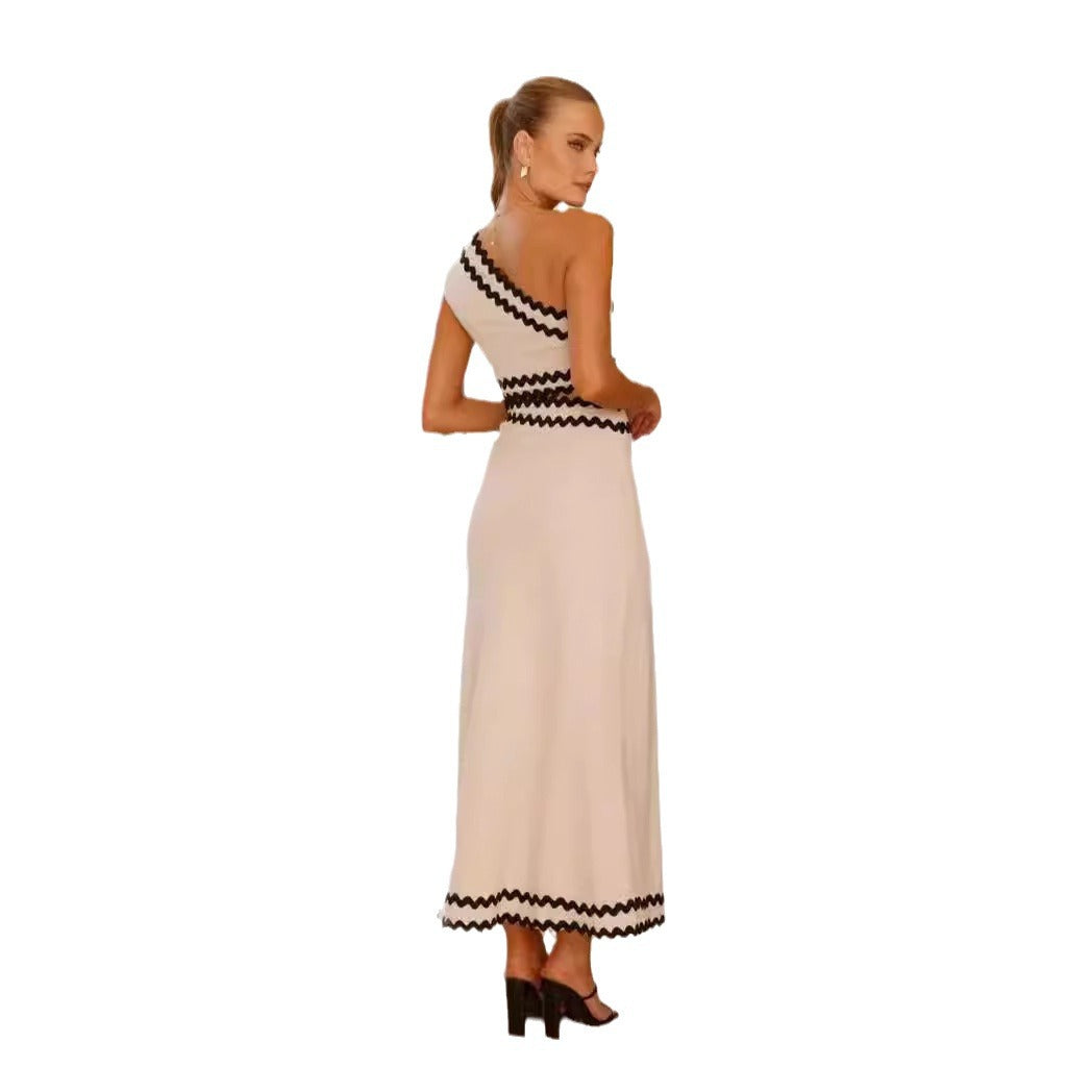 Ladies maxi dress with asymmetric cut and stylish cut-outs