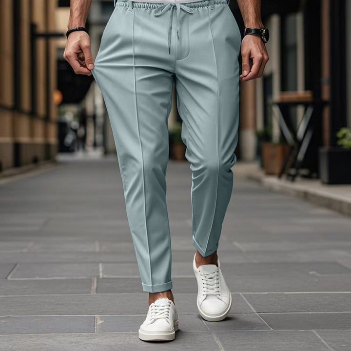 Men's fashionable sports pants with elastic waistband and practical welt pockets Lune London