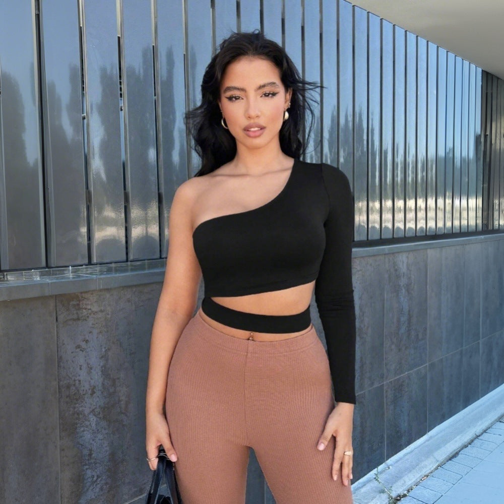 Asymmetrical cropped women's top with one long sleeve Chic & Stil