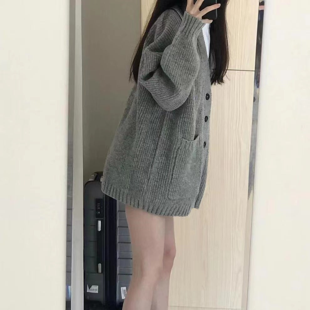 Oversized knit jacket for women with button closure and practical pockets Lune London