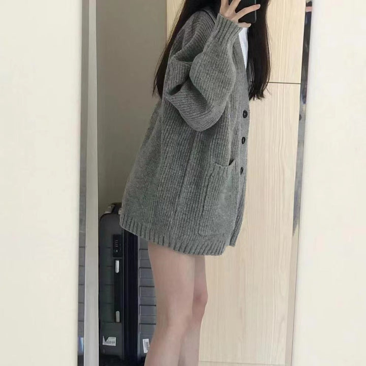 Oversized knit jacket for women with button closure and practical pockets Lune London