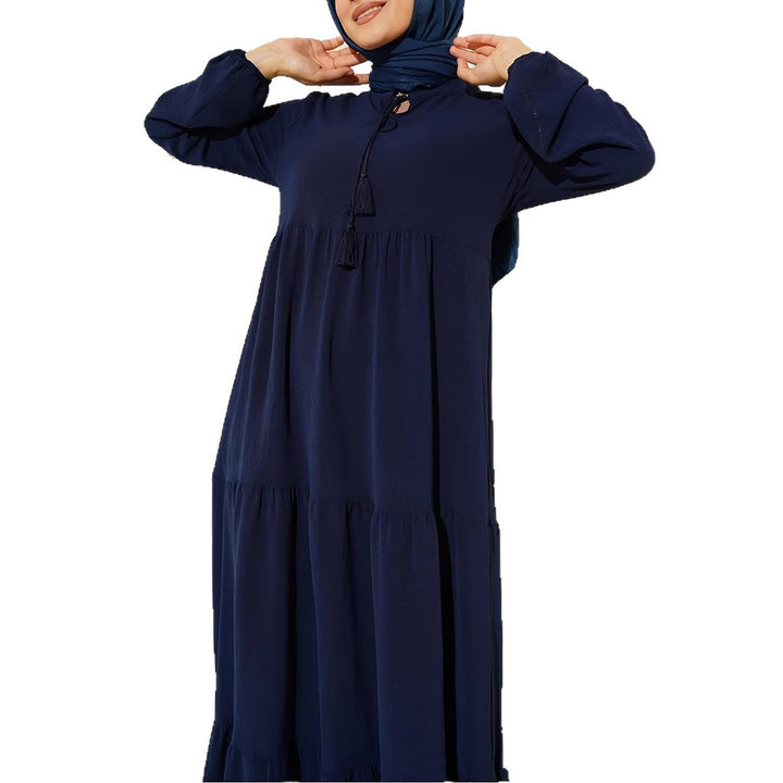 Maxi dress for women with voluminous skirt and fine fringes Lune London