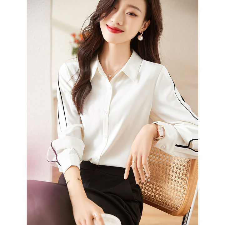 Blouse élégante pour femmes avec détails de boutons classiques Chic & Stil