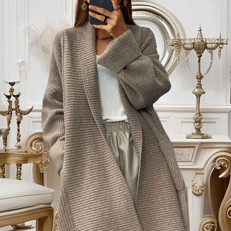 Long knitted coat for women with textured design and pockets Lune London