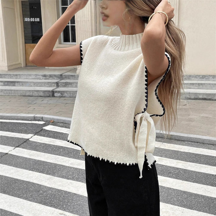 Knit top for women with unique cutouts and a playful knot Lune London