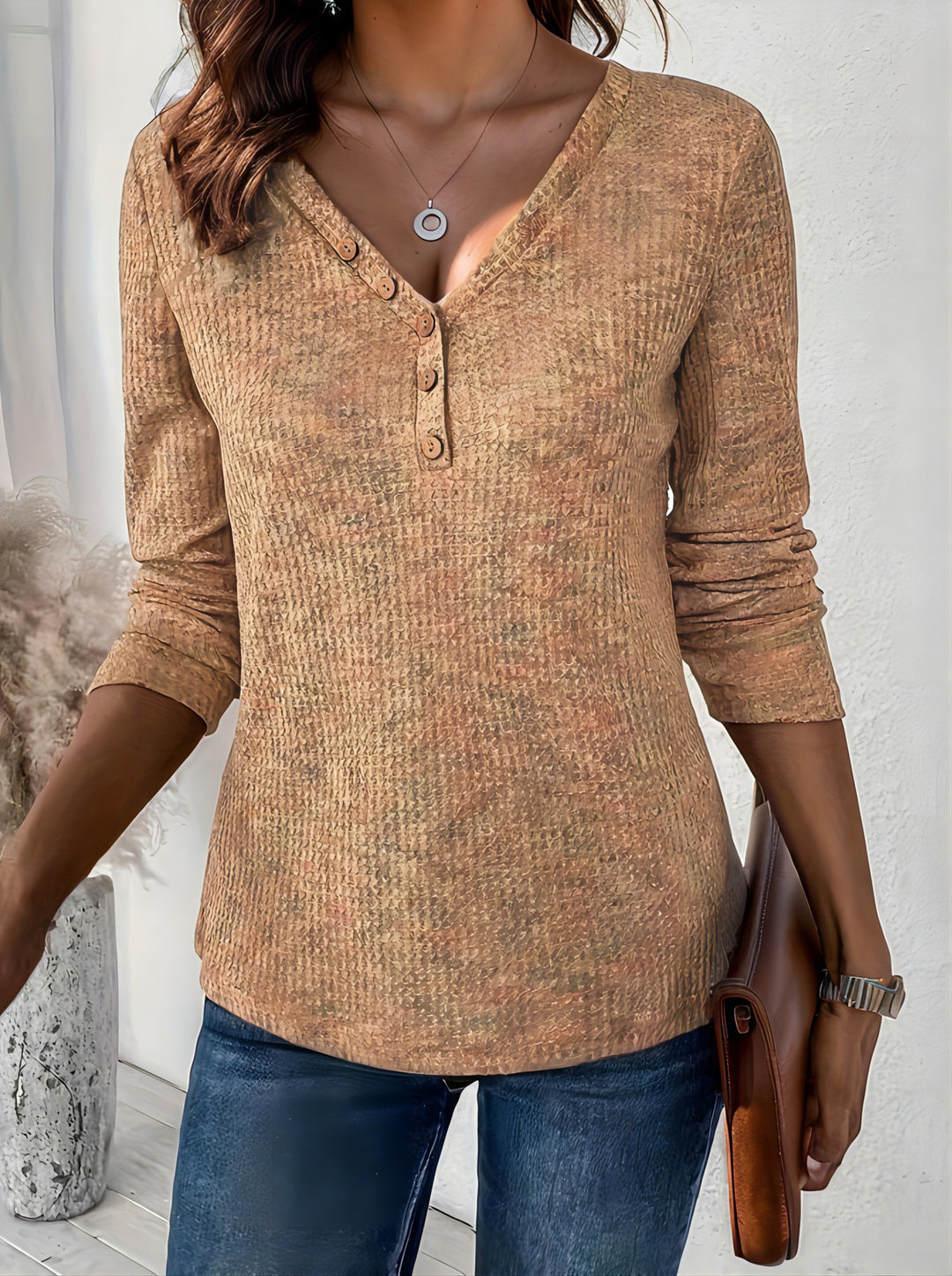 Long sleeve t-shirt for women with textured design and button details Lune London