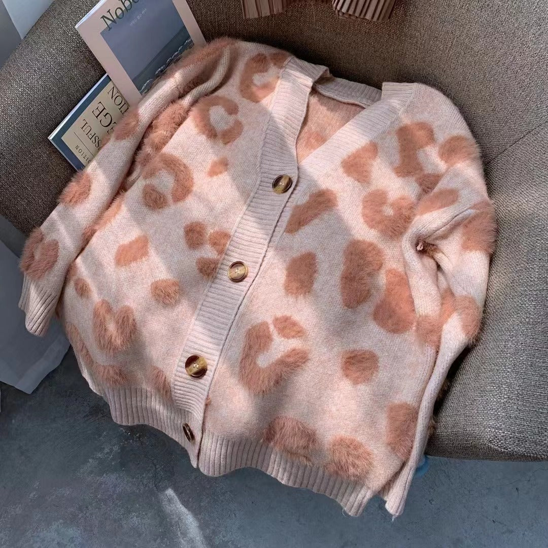 Sweater vest for women in cozy knit with heart shape design and button detail Lune London