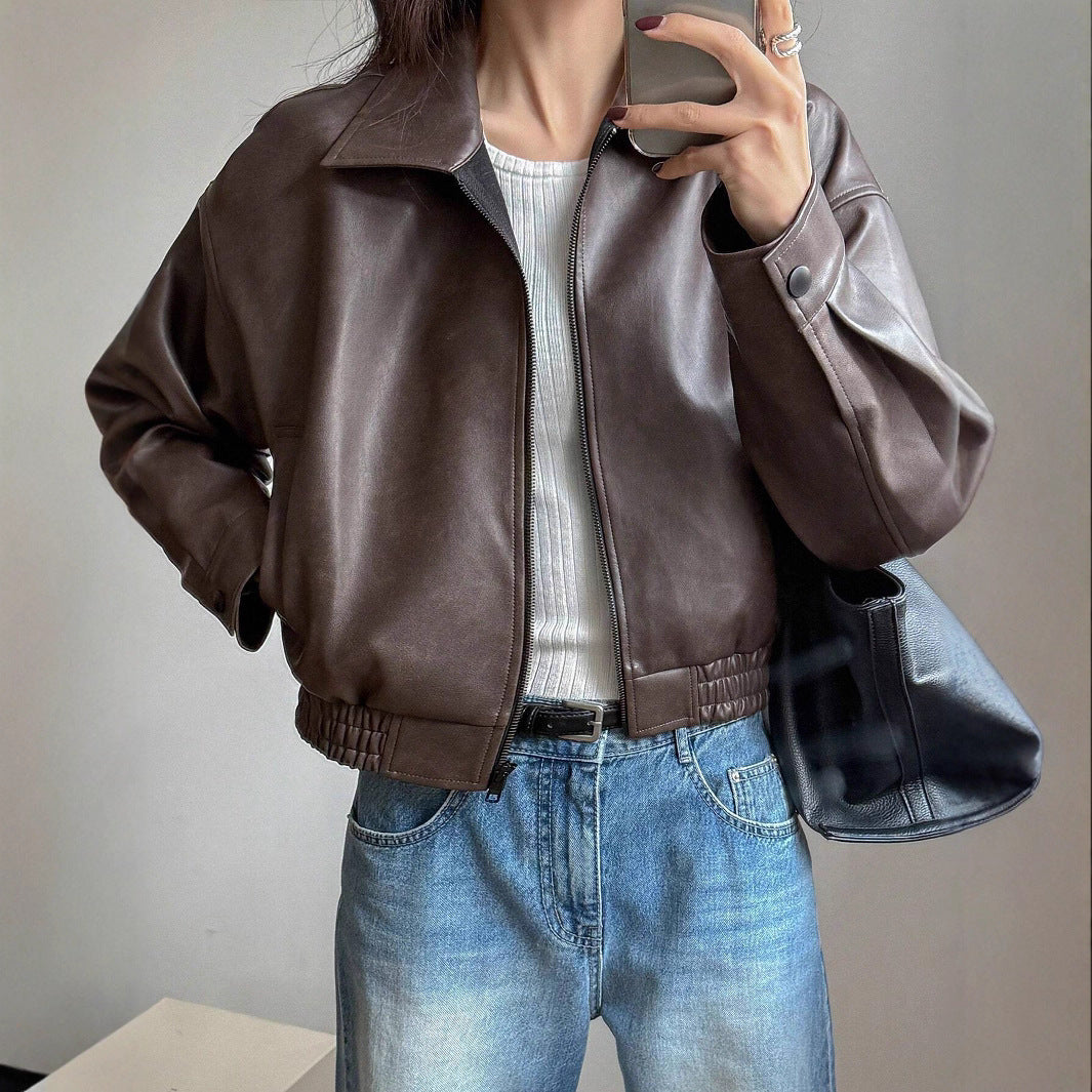 Trendy short coat for women in soft faux leather with elastic straps Lune London