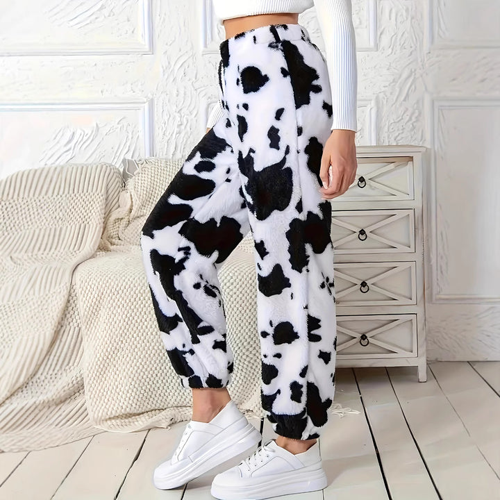 Women's plush pants with a trendy cow spot pattern and an elastic waist Lune London