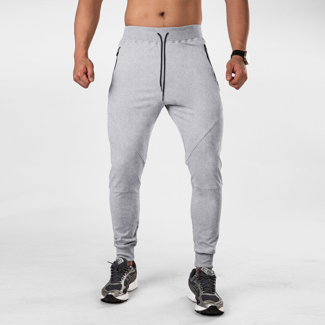 Men's sporty jogging pants with functional zip pockets Lune London