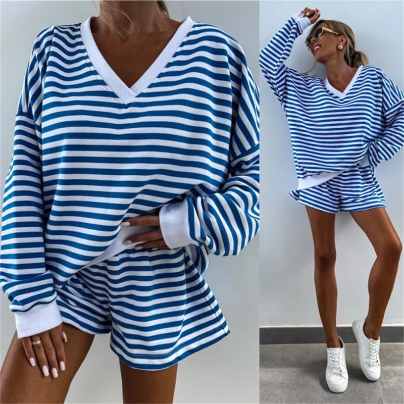 Casual outfit for women with oversized V-neck sweater and shorts Lune London