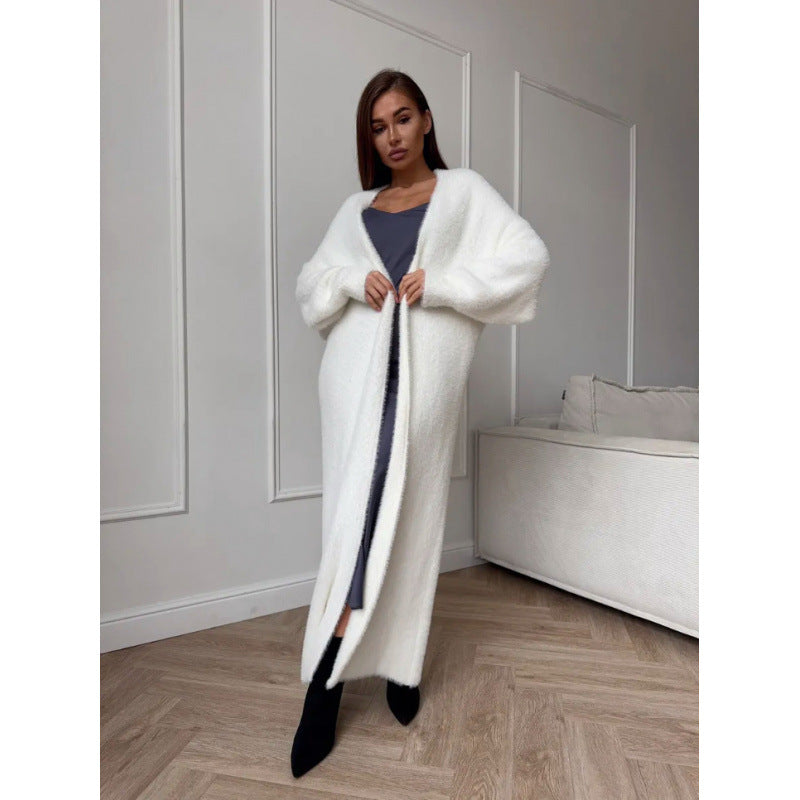Manteau long en tricot duveteux pour femme avec une coupe élégante et des manches amples Chic & Stil