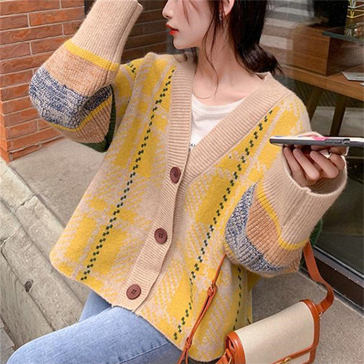 Ladies oversized knitted sweater with colorful checked pattern and large wooden buttons Lune London