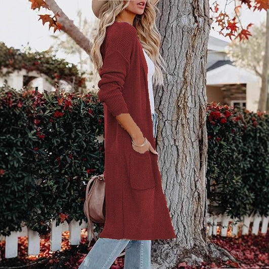 Long knitted cardigan for women with open pockets and fine rib design Lune London