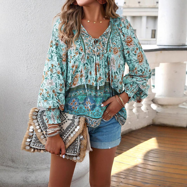 Lightweight women's blouse with a refined floral design and a relaxed fit Lune London