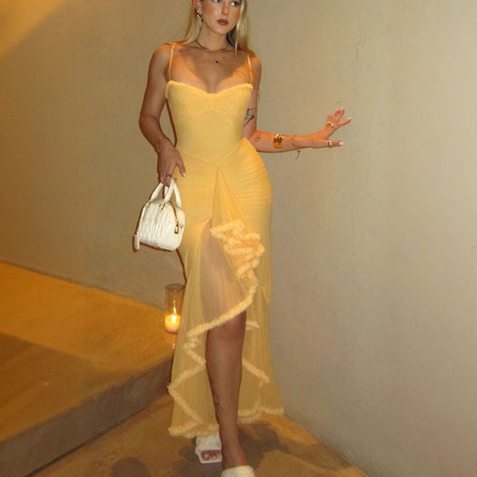 Women's maxi dress with an elegant ruffle design and artistic draping Lune London