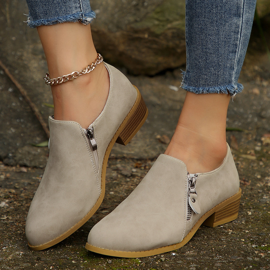 Trendy ankle boots for women with a chic zipper design Lune London