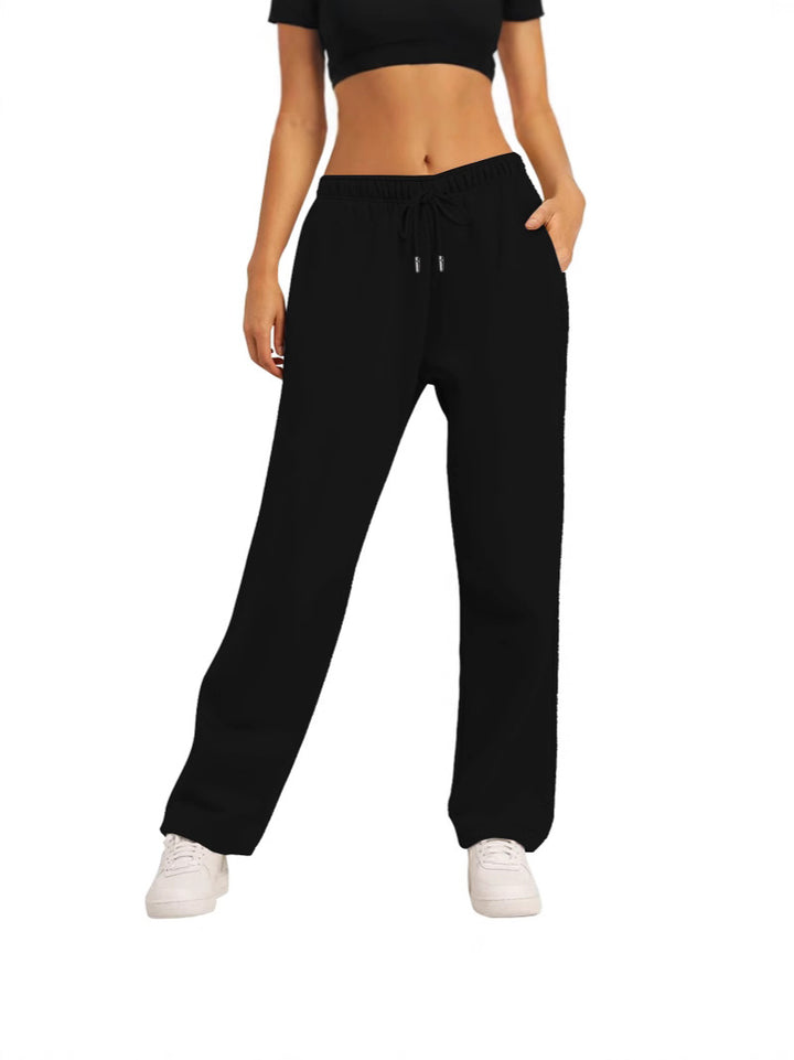 Women's wide casual pants with elastic waistband and practical side pockets Chic & Stil 1773783716