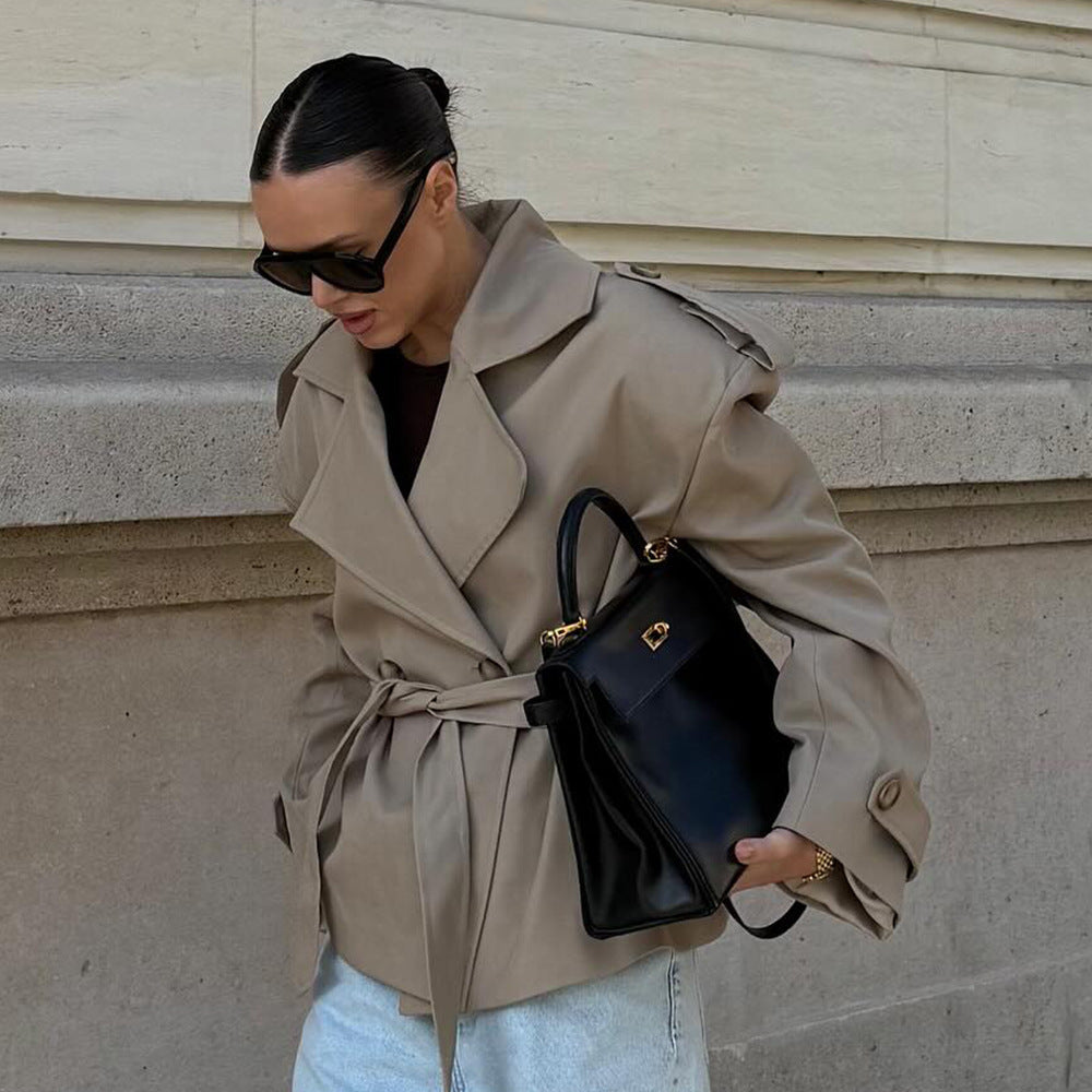 Elegant trench coat for women with fitted belt and bare shoulders Lune London