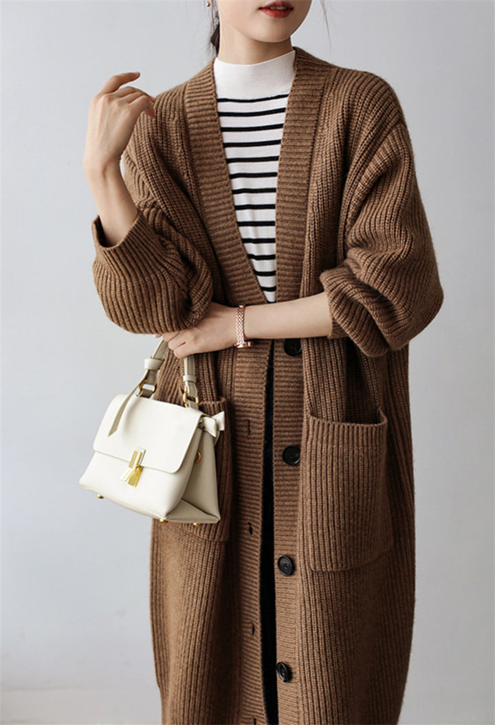 Knit coat for women with practical side pockets and elegant button details Lune London