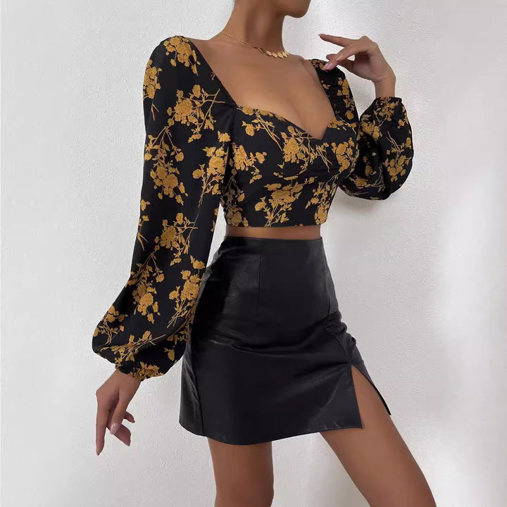 Short women's top with floral pattern and elegant puff sleeves Chic & Stil