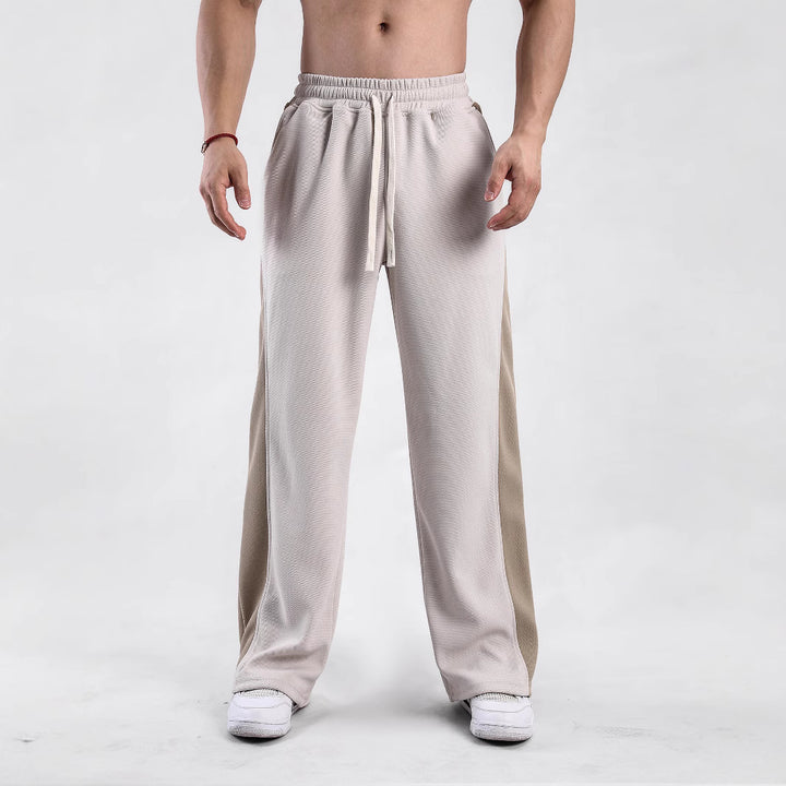 Men's sporty leisure pants with side ventilation openings and elastic waist Lune London