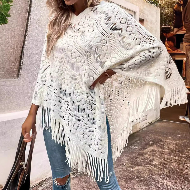 Ladies' knitted poncho with artistic crochet patterns and fringes Lune London