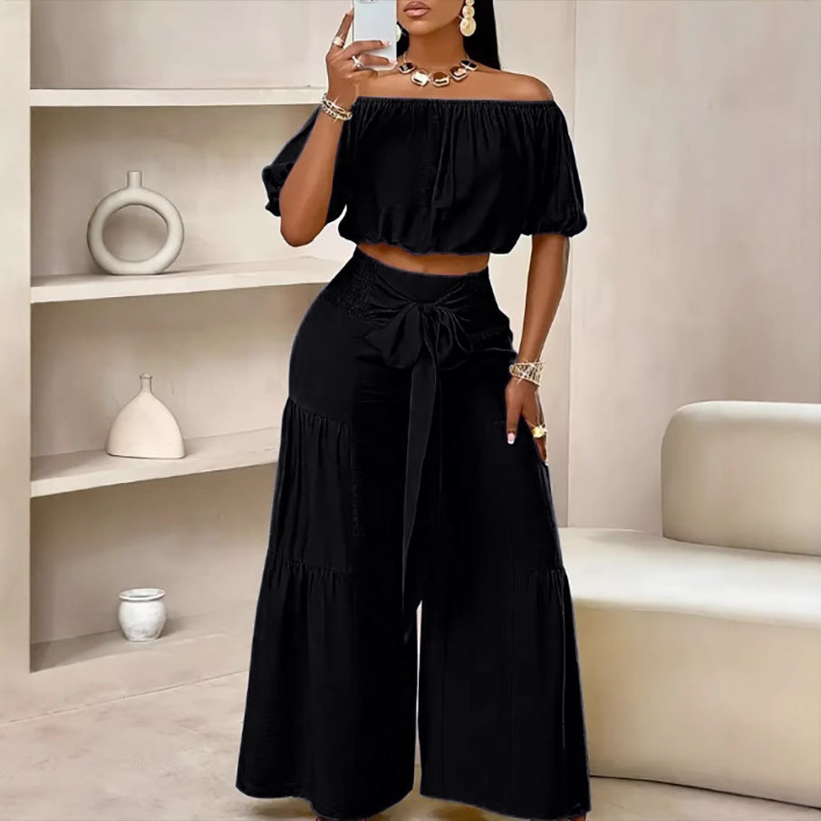 Woman Deep V-Neck Crop Top and High-Waisted Palazzo Pants Lune London