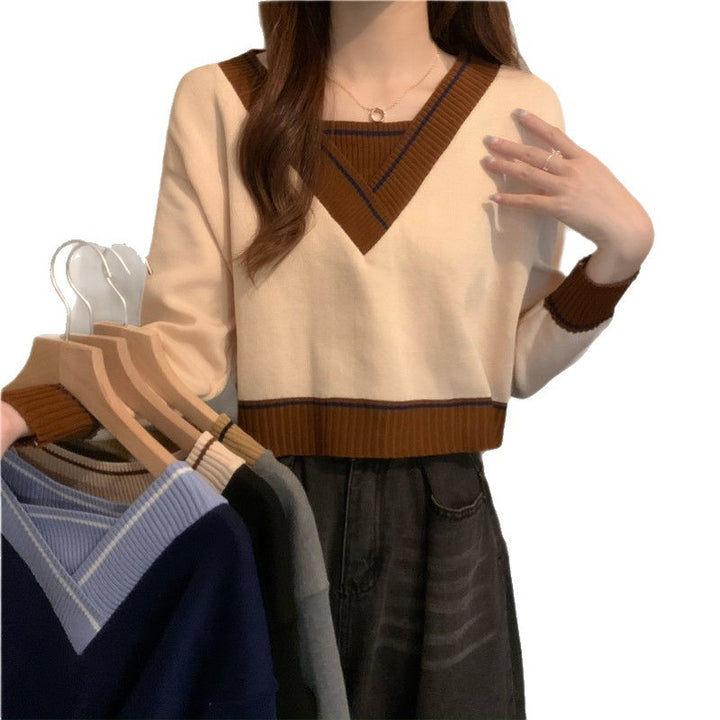 Pull féminin à la mode en V avec détails contrastés Chic & Stil