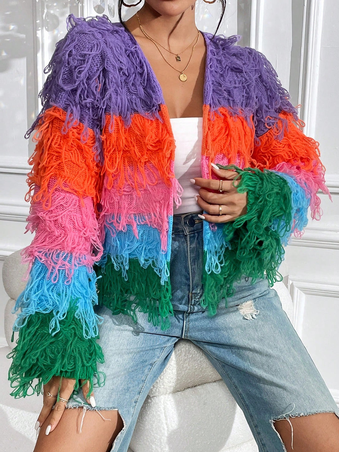 Ladies knitted cardigan with colorful fringes and a unique pattern Lune London