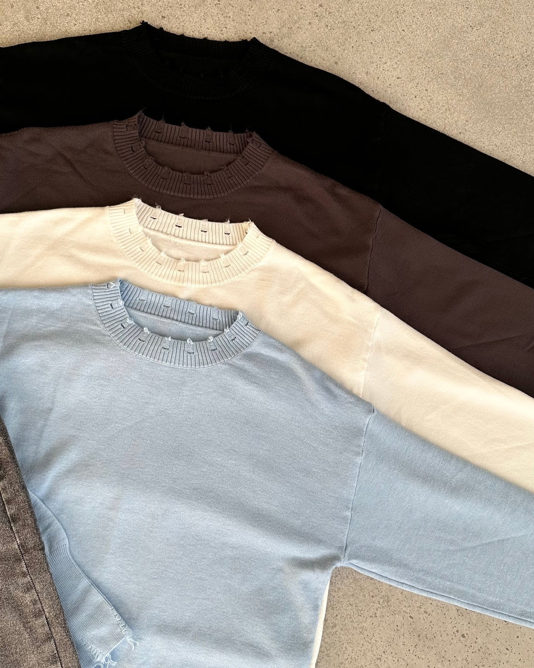 Casual sweater for women with a modern ribbed collar and trendy rip details Lune London
